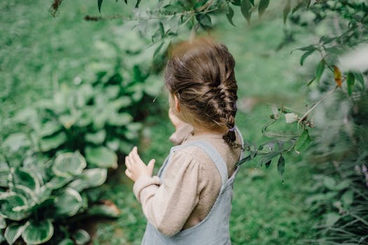 Kids measuring plant growth